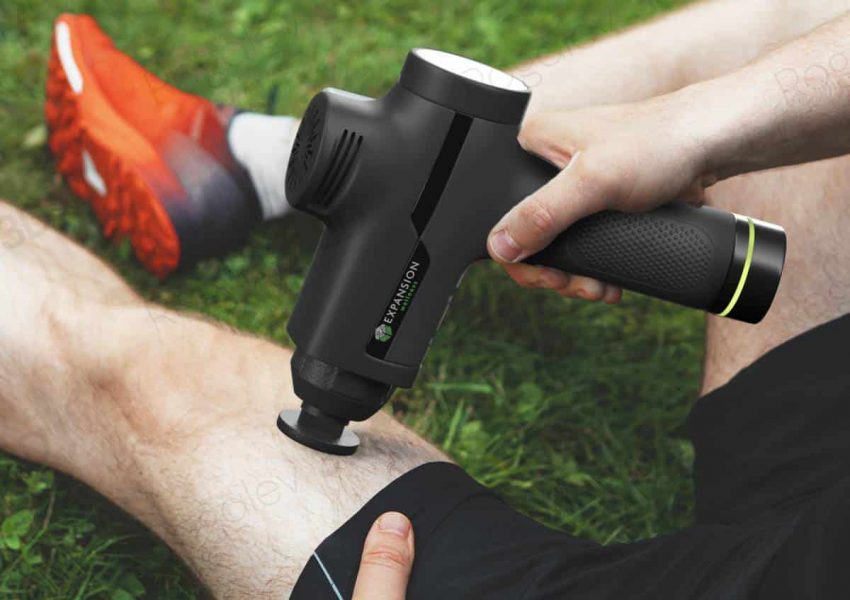 Man massaging leg with massage percussion device after workout.; Shutterstock ID 1805635585; Usage: -